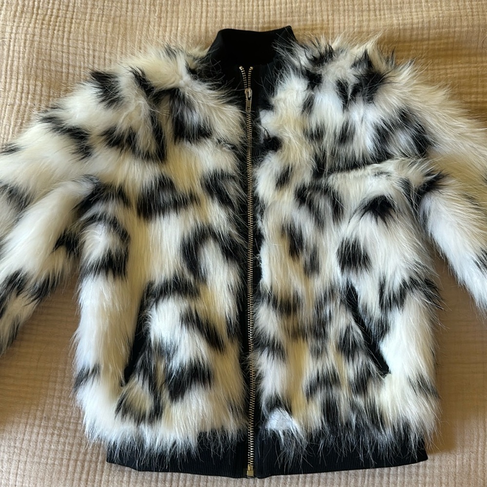 Girls faux fur coat.